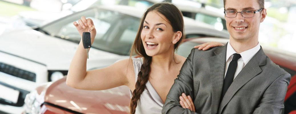 Couple showing car keys